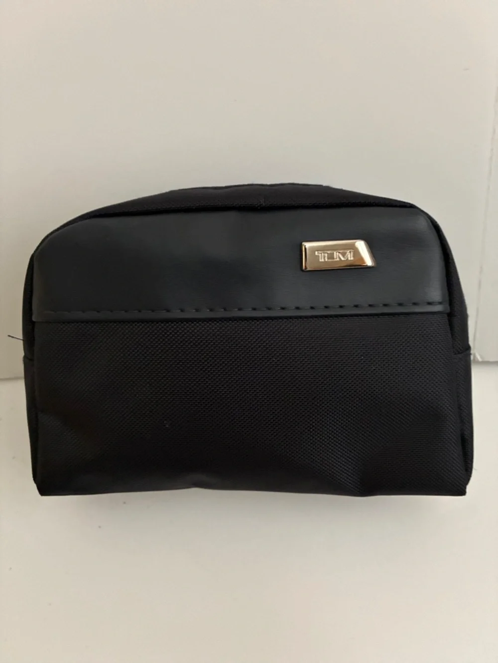 Tumi Black Men's Toiletry Pouch with Gold Accent